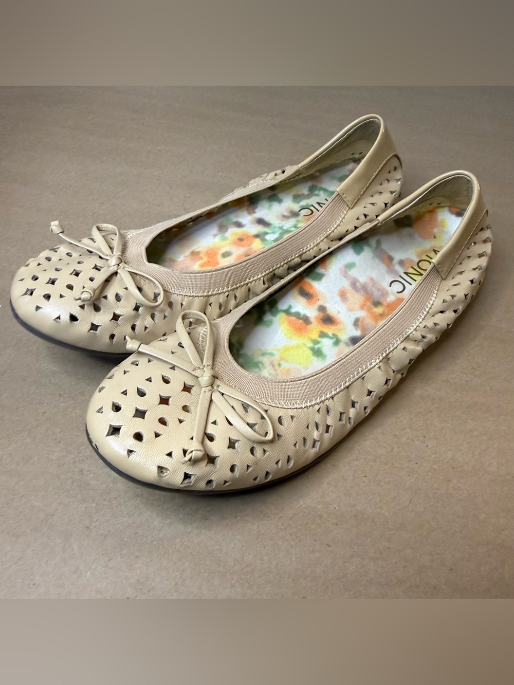 Vionic Beige Perforated Ballet Flats with Bow Accent